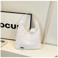 White faux fur shoulder bag with silver handle and heart charm in a cute style - White