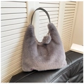 Chic gray faux fur crossbody bag for women with black strap and fluffy pompom detail - Gray