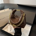 Brown faux leather dumpling shoulder bag with gold chain and vintage lychee texture - Brown