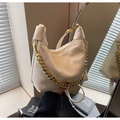 Chic beige quilted hobo bag with a stylish gold chain strap and smooth faux leather finish - White