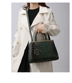 Dark green crocodile texture handbag with gold metal accents and shoulder strap - Green
