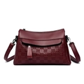 Burgundy women's quilted tote bag featuring leather texture and adjustable shoulder strap - Burgundy