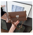Brown vintage flap handbag with silver metal lock and textured leather stitching details - Brown