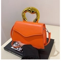 Orange crossbody bag with a unique gold metal handle and adjustable strap for women - Orange