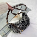 Winter faux fur leopard print crossbody bag with knotted brown leather straps - Black