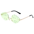 Unique gold frame sunglasses with light green monstera leaf shaped lenses for parties - Gold Frame Green