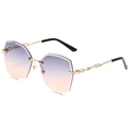 Lunettes de soleil géométriques sans monture, verres dégradés violets et branches dorées - Monture Dorée Gris Orange Dégradé