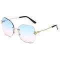 Frameless metal sunglasses with blue-pink gradient lenses and gold leopard embossed temples - Gold Frame Blue Pink