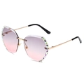 Randlose polygonale Sonnenbrille mit rosa-violetten Verlaufsgläsern und Strassbesatz - Goldener Rahmen Grau-Rosa Gläser