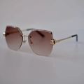 Lunettes de soleil sans monture avec verres dégradés marron et branches dorées - Monture Dorée Thé Dégradé