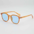 Retro-Rundsonnenbrille mit Schildpatt-Muster und hellblauen Gläsern im 45-Grad-Winkel - Orangerotes Schildpatt-Gestell Blaue Gläser