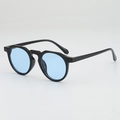Occhiali da sole retrò con montatura nera rotonda e lenti blu per un look alla moda - Montatura Nera Lenti Blu
