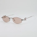 Lunettes de soleil hexagonales sans monture avec branches en métal et gemme rose - Champagne