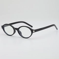 Chic oval sunglasses with glossy black frames and vintage silver metal temple accents - Black Frame Clear Lenses