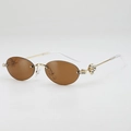 Oval brown rimless sunglasses with gold metal frame and rhinestone accents - Tea Lens