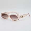 Lunettes de soleil ovales champagne avec verres dégradés bruns et détails en métal doré - Thé Champagne