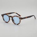 Retro round tortoiseshell sunglasses with light blue lenses and silver metal rivets - Tortoiseshell Frame Blue Lens