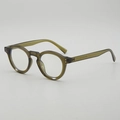 Retro round frame glasses in translucent olive green with silver rivet detailing - Olive Green Frame Clear Lens