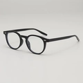Classic black round eyeglasses frame with silver accents and retro vintage design - Black Frame Clear Lenses
