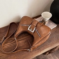Vintage brown half-moon underarm bag with decorative leather strap and silver buckle - Brown