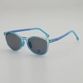 Occhiali da sole bimbi azzurro traslucido con lenti grigie e aste bicolore a contrasto - Blu Trasparente / Grigio