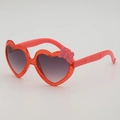 Kids heart-shaped glitter sunglasses with pink bow and gradient lenses from a 45-degree angle - Red Frame Double Grey Lens