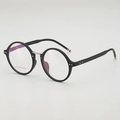 Vintage black round eyeglasses frame with silver bridge and signature stripe detail - Matte Black