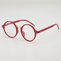 Monture de lunettes ronde rouge rétro avec pont en métal doré et embouts tricolores - Monture Rouge Transparente Verres Unis