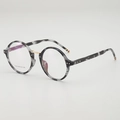 Lunettes rondes vintage aspect marbre gris avec détails en métal doré élégants - Monture Écaille de Tortue