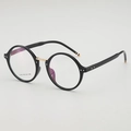Lunettes rondes classiques à monture noire brillante et pont nasal doré de style vintage - Monture noire brillante verres clairs