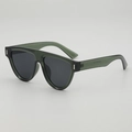 Occhiali da sole retrò oversize con montatura verde scuro e accenti argentati sulle aste - Montatura verde traslucida Lente grigia