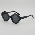 Avant-garde irregular geometric sunglasses with thick black frames and dark grey lenses - One Size / Black Frame Grey Lens