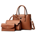 3-teiliges Set aus karamellfarbenen Lederhandtaschen mit Shopper, Umhängetasche und Geldbörse - Hellbraun