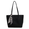 Black pebbled leather tote bag with a decorative silk scarf on the top handle - Black