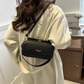 Minimalist black leather box bag for women with gold twist lock and adjustable strap - Black