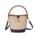 Bolso saco de lona beige y cuero azul marino con cierre de metal dorado - Azul