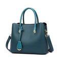 Peacock blue leather tote bag with snakeskin texture and golden metallic hardware - Blue