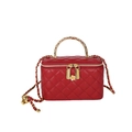 Red quilted leather mini bag with gold chain strap and floral zipper charm - Red