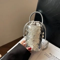 Sparkly silver sequin bucket handbag for women with elegant chain strap and drawstring - Silver