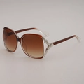 Oversized amber frame sunglasses with brown gradient lenses and floral metal hinge detail - Transparent Tea Frame Double Brown Lens