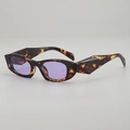 Tortoiseshell cat-eye sunglasses with wide temples and purple lenses at a 45-degree angle - Demi Frame Purple Lens