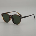 Retro oval sunglasses with leopard print frame and dark green lenses in a 45-degree view - Floral Print Frame Green Lens
