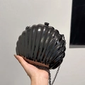 Gunmetal metallic shell-shaped clutch bag with sleek chain strap and ribbed texture - Gunmetal
