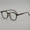 Vintage oval sunglasses with tortoise shell frames and classic metal rivet accents - Tortoise Shell Frame