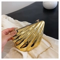 Golden shell-shaped acrylic clutch bag with radiating textures and metal chain strap - Gold