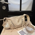 Beige faux leather hobo shoulder bag with tassel zippers and a heart shaped mirror charm - Khaki