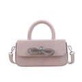 Light pink handbag with crystal bow detail and adjustable shoulder strap in light pink - Khaki