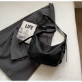 Minimalist black hobo bag in vintage textured faux leather with adjustable strap - Black