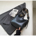 Chic black bucket bag with vintage gold hardware and ethnic style wide woven shoulder strap - Black