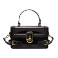 Minimalist black patent leather crossbody bag with golden hardware and glossy finish - Black